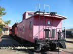 A Pink Northern Pacific Railway Caboose 
