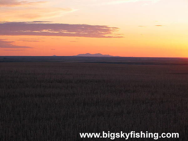 Sunset Over the Distant Sweet Grass Hills in Montana