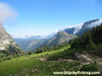 A hiker on the Highline Trail near Logan Pass