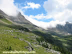 Clouds continue to spill over the Continental Divide