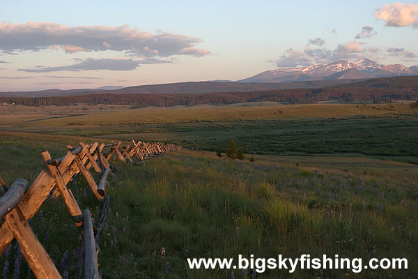 Fence, Grasslands and Scenic Sunset