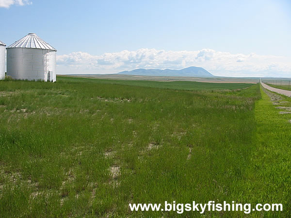 Distant Sweet Grass Hills Seen Near Sunburst, Montana