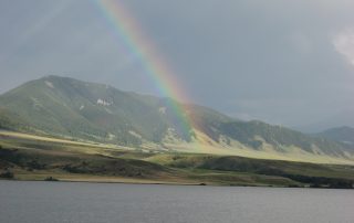 Rainbow over Ennis Lake